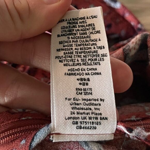 Free People Some Like It Hot Jumpsuit in Rust Combo - Picture 9 of 15